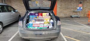 Car boot filled with food bank donations